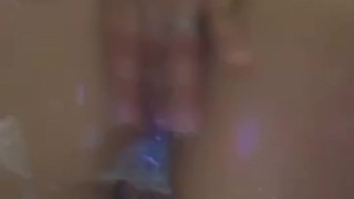 HORNY SLUT PLAYS WITH PUSSY IN THE SHOWER