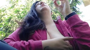 We smoke a cigarette together in a public garden while I show you my big boobs