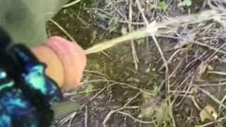 Pissing outdoors wearing a thong