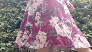 Under this sexy long dress I wear a diaper ready to be filled with pee in this park