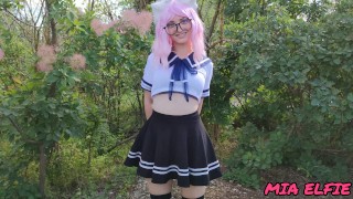 Sexy schoolgirl with ears in uniform walks down the abandoned road