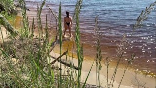 Sexy nudist girl on a wild beach