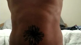 Sexy tattoo guy showing off in underwear
