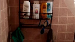 Sexy guy taking shower at the gym