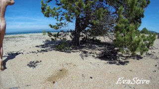 Walked behind a tree and pee standing on the beach