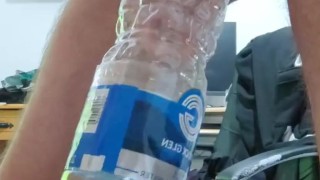 Pissing in the empty bottle like a champ