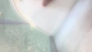 Lad showing ass and cock in shower