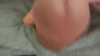 Stroking hard cock in bathroom