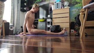 Very skinny lad stretches out his body on a yoga mat