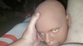 Doll giving head.