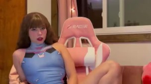 Sexy DVA cosplay girl riding toy in game chair