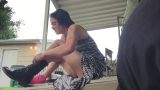Brunette MILF puts on combat boots with dress