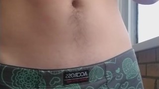 handsome guy in panties with a big standing cock spying on a neighbor