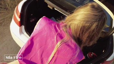 Fitness girl Mia Fire fucked in the field by the car