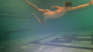 Naked swim and cum with metal cockring and plug