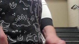 Jerk in stairwell at resort with cum shot