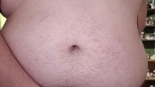 Fat guy wearing bodysuit strips and cums