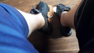 Stepping on the teddy bear with my sneakers