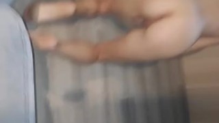 The wife inserts anal plug