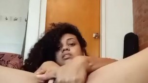 latina plays with a dildo in her delicious pussy