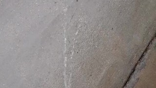 Pissing outsude in a summer shower