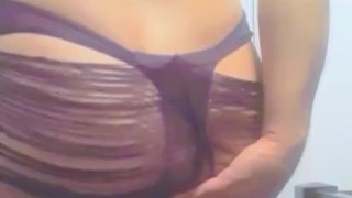 Feminine crossdresser playing with a dildo and coming hard