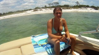Milf in bikini flashes big tits and pussy on boat