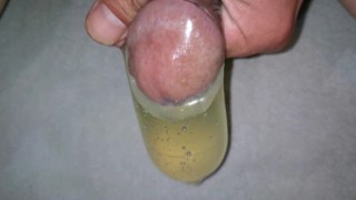 Filling condom with piss