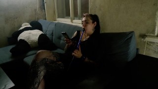 Tattoed girl smokes hookah and plays with her pussy