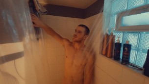 Redhead amateur edges his partially hard cock and moans for you after taking a shower