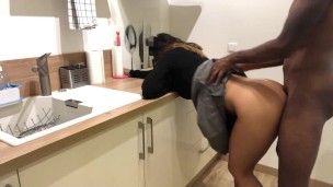 She cooks with a skirt that molds her big ass