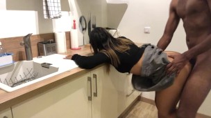 She cooks with a skirt that molds her big ass