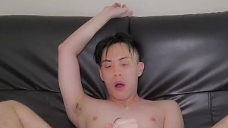 Asian twink with butt plug jacking off and cumming