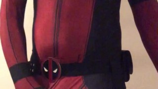 in DEADPOOL costume with NO UNDERWEAR ON and that BIG PACKAGE