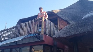Bikini slut pissing from a balcony