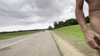Standing beside interstate completely naked in broad daylight with cars passing and seeing me