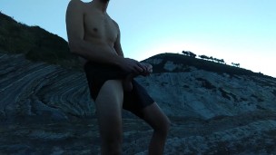 Horny Slim Brown Guy Jerks off Hard in a Heavenly Place Under the Sunset