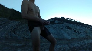 Horny Slim Brown Guy Jerks off Hard in a Heavenly Place Under the Sunset