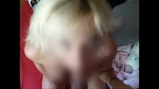 Shy blonde amateur sucking a fan !