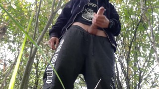 Scally lad dominant spits, pisses and jerks off his big cock in sportswear in public