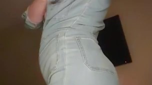 Redhead over jeans tease