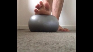 Super squishy gym ball under my big male feet tiny ball makes my feet feel enormous - MANLYFOOT