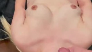 Milf takes load on tots, licks cum