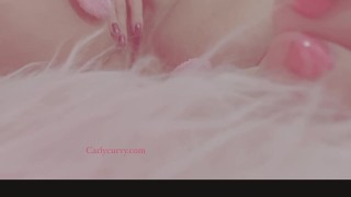 Cute socks and pussy play in a soft pink setting! 