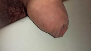 uncutted foreskin close up while peeing