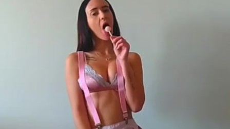 Sexy nasty teen babe with amazing boobs plays with pink lingerie and fucks her pussy with lollypop