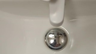 Jerking im public restroom finisched with piss
