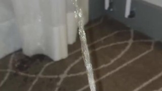 Naughty pisser soaks carpet and drapes