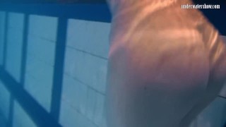 Babes swim strip and have fun underwater