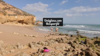 Horny girl and guy undress on a public beach and masturbate - risky